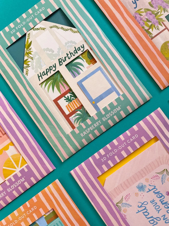 Each card has a beautifully painted striped wallet in either lilac, mint or sunshine yellow. Keeping both the card and envelope inside protected