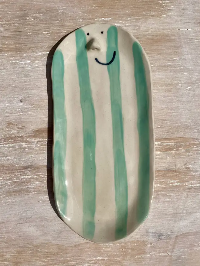 green long trinket dish front on