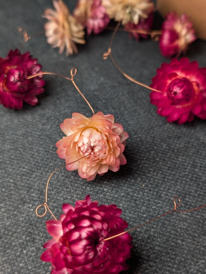 Pink flowers on wire