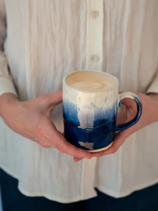 lulworth cove ceramic glazed mug, jenny hopps pottery, blue and white ceramic mug