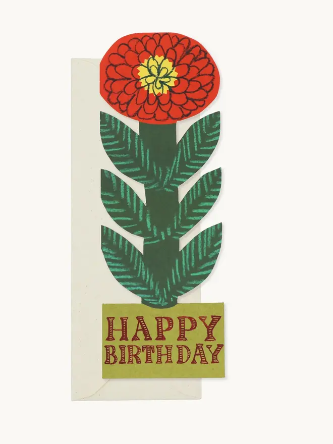 red and green flower shaped card with happy birthday text