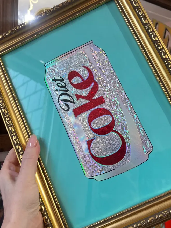 'Diet Coke' Can ScreenPrint, a person holding a colourful diet coke screenprint. 