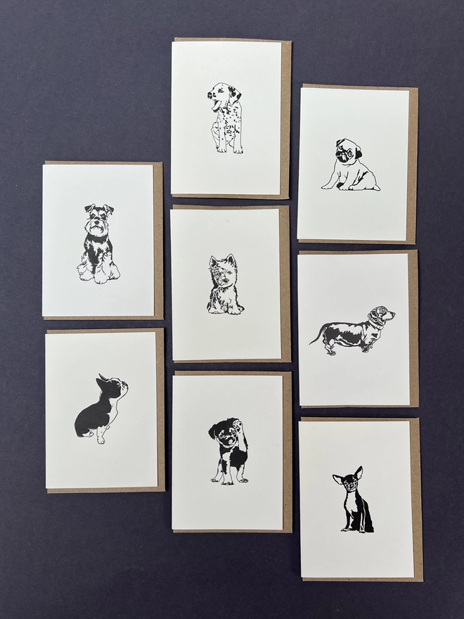 An image showing all eight puppies that are in the Town dogs gift box perfect for those little thank you's or love you's