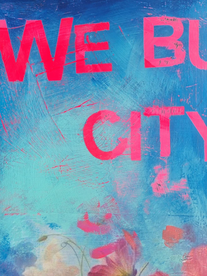 A vintage tallboy cabinet painted in vibrant blues, neons and flowers with the text that reads 'we built this city on rock and roll' in neon pink.