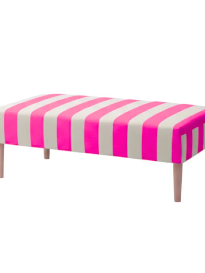 Hand Painted Upholstered Striped Linen Coffee Table Ottoman, neon pink coffee table sitting against a white backdrop. 
