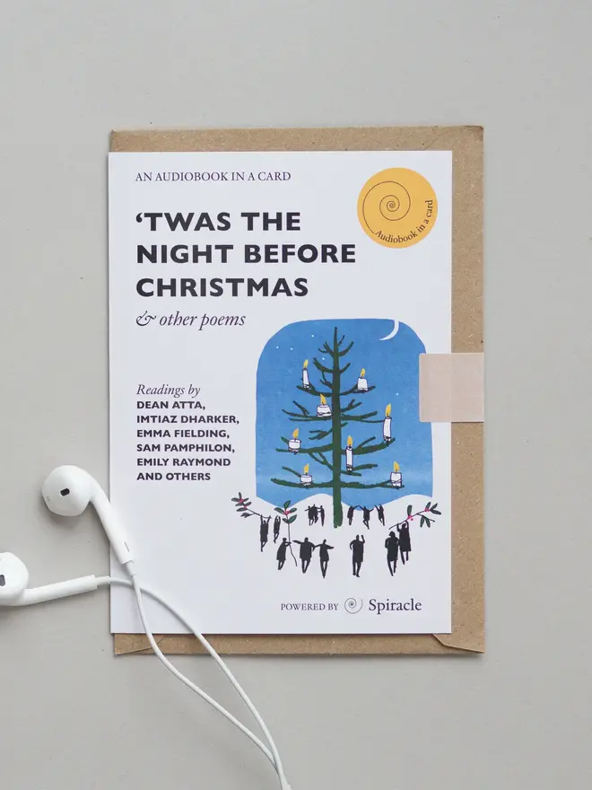 'Twas the Night Before Christmas'  Audiobook Card, on a grey table, next to headphones. 