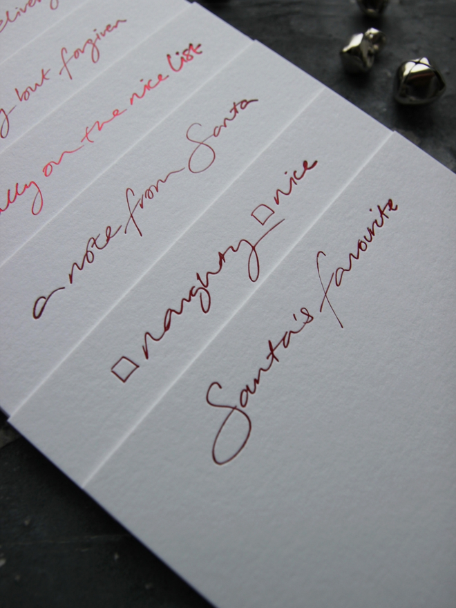 mixed set of hand foile Santa notecards blank for you to write messages, they come with matching envelopes foiled with North Pole Mail