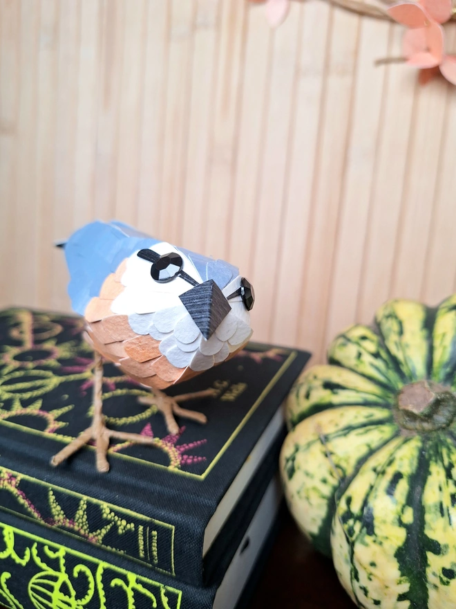 Nuthatch standing bird sculpture