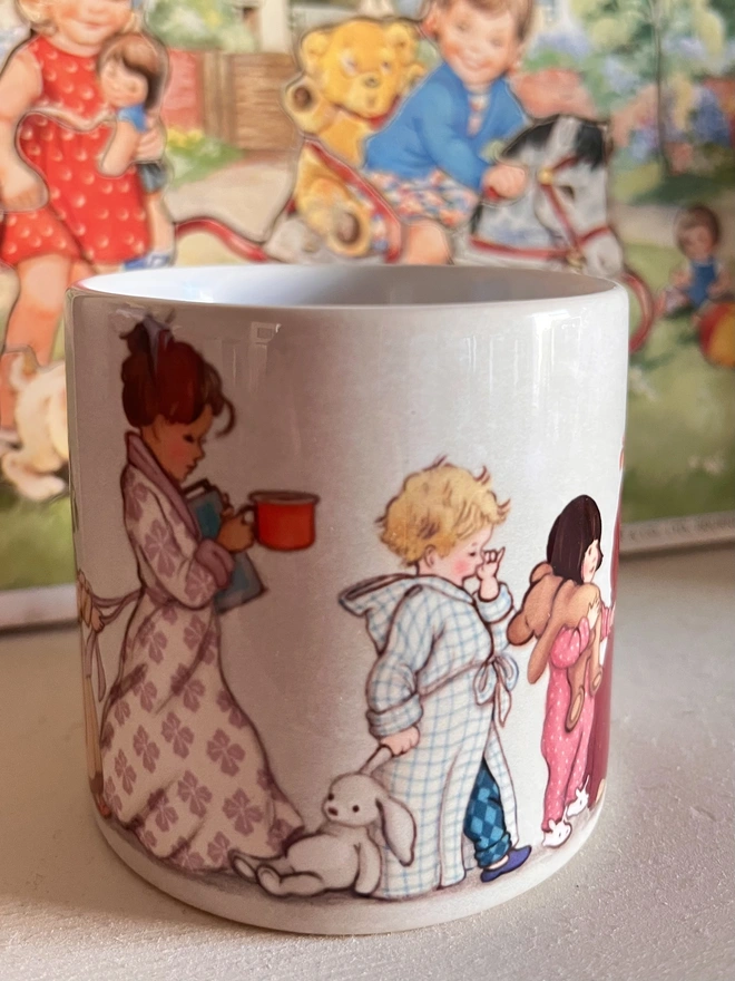 an illustrated child's bedtime mug