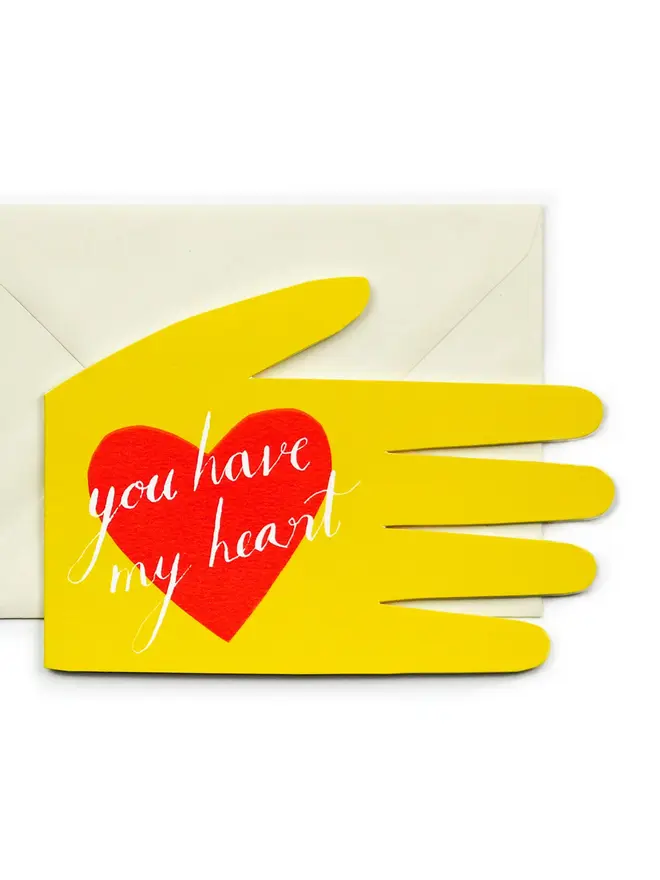 yellow hand shaped card with red heart
