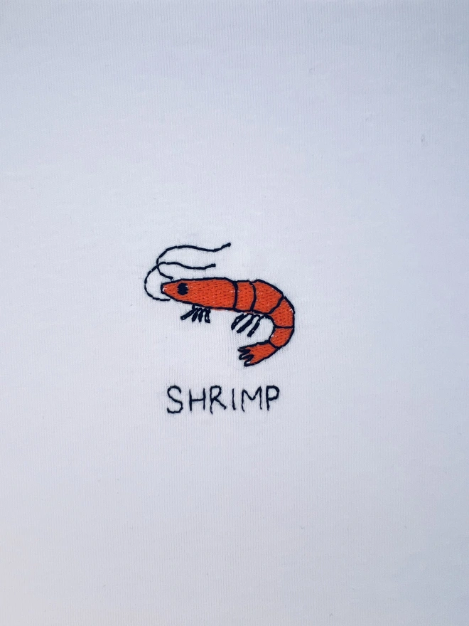     White T-shirt embroidered with red shrimp motif