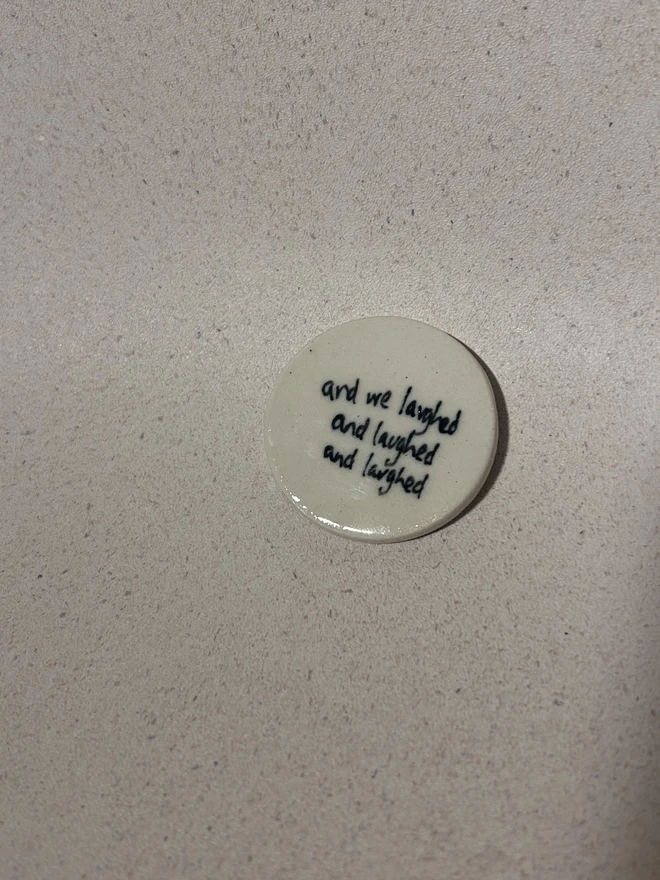 Love token saying 'any we laughed and laughed and laughed'