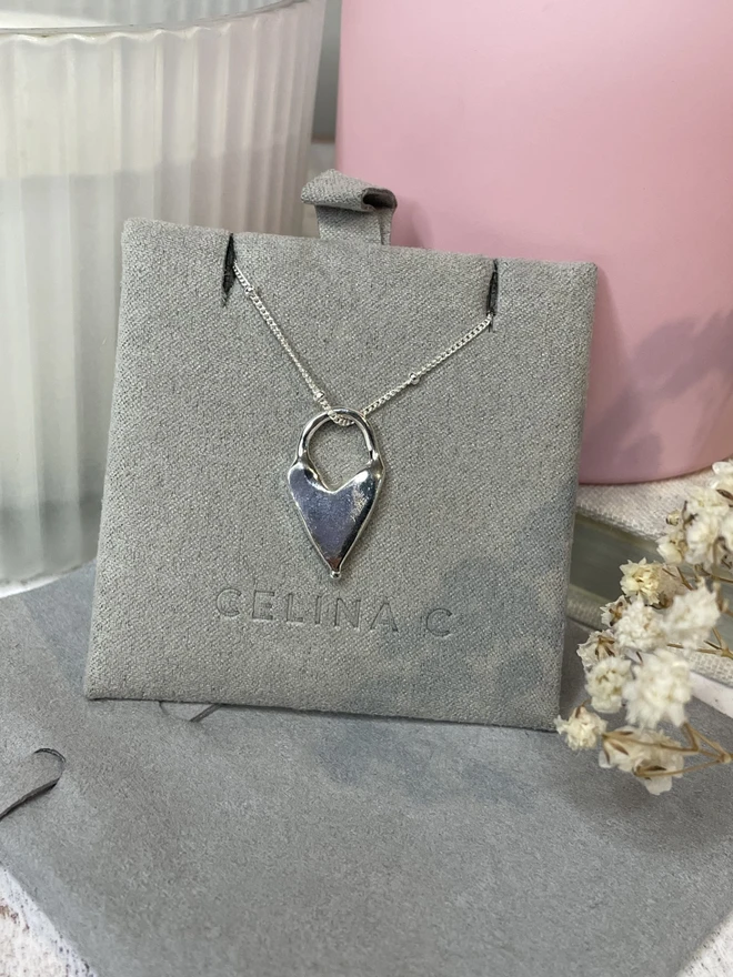 Hand made heart charms made from 100% recycled sterling silver, cute gift for girlfriend or wife for Valentine's Day or Mother's Day. Send straight to your special someone. Made by Celina C Jewellery, a small business in the UK, find on Holly and Co.