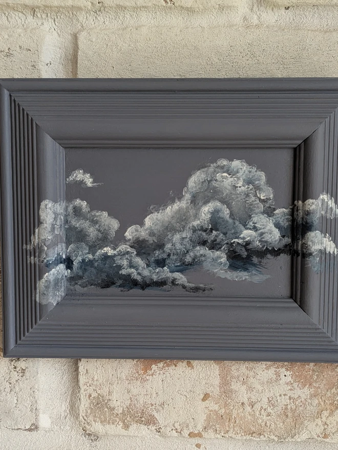 old violet clouds painting on vintage frame