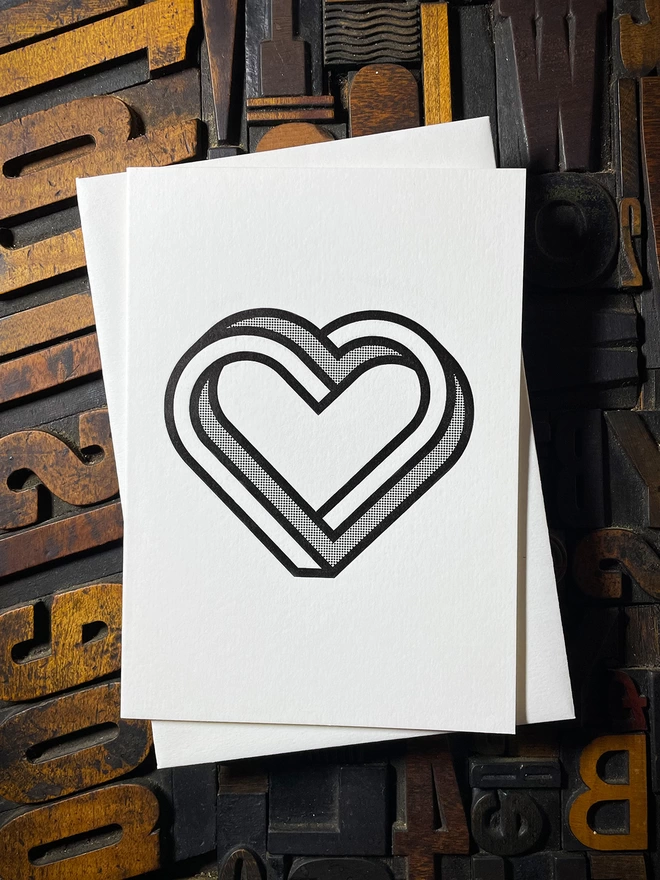 MONO INFINITY HEART LETTERPRESS CARD. Printed on my 1915 Arab Crown Folio Press. Black ink using a deep impression print. Printed on the finest Colorplan Pristine White thick double-sided card with a range of matching colours self-seal envelope.