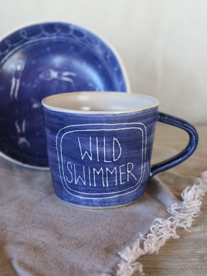 wild swimmer mug with linen cloth