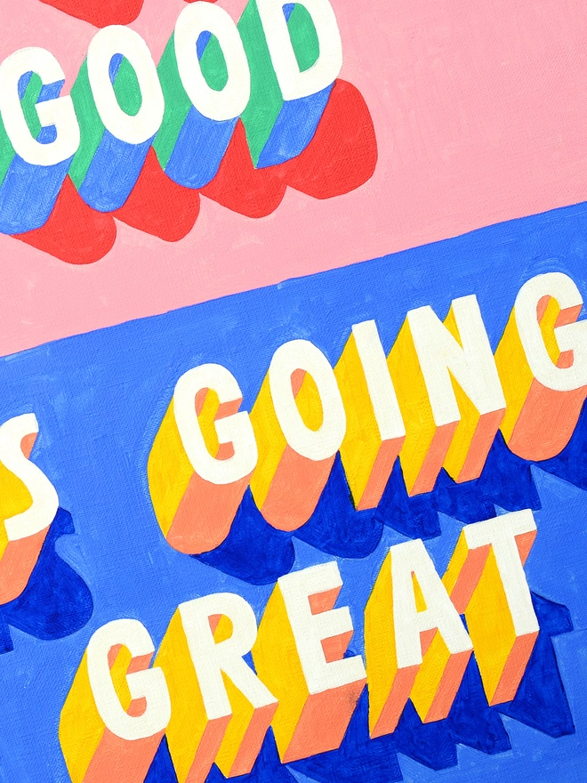 Detail of a painting showing the words ‘Good Going Great’ in 3d typography in pink, green, blue and yellow by artist Survival Techniques.