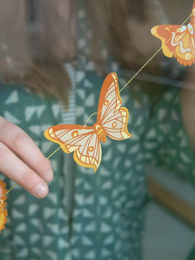 yellow british butterflies paper garland decoration