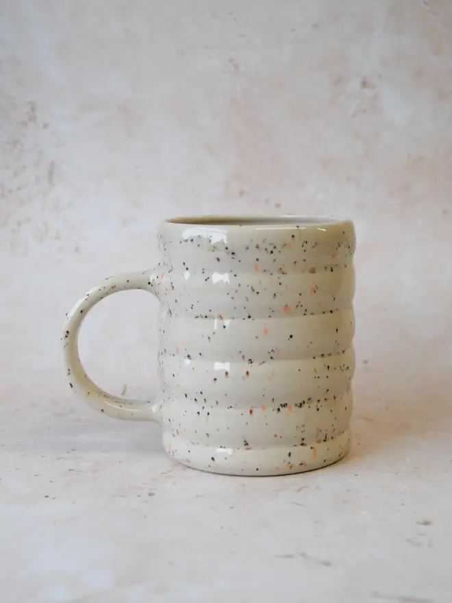 Speckle Pop’ handmade ceramic mug — side view showing ribbed texture