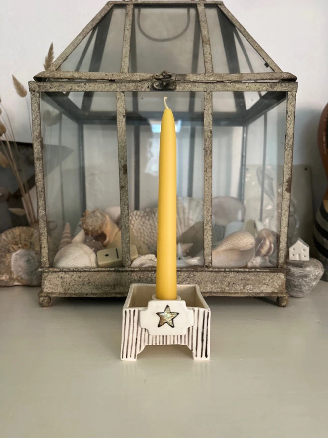 square star candle holder on display