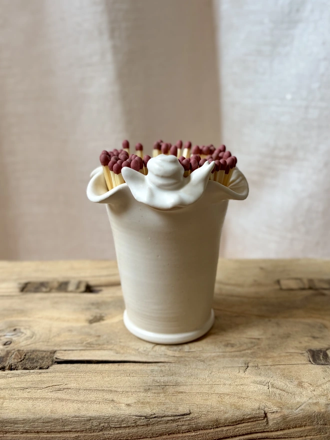 Ceramic match stick pot with hand sculpted snail