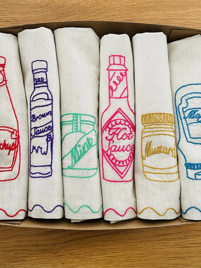 embroidered condiment napkins in a gift box