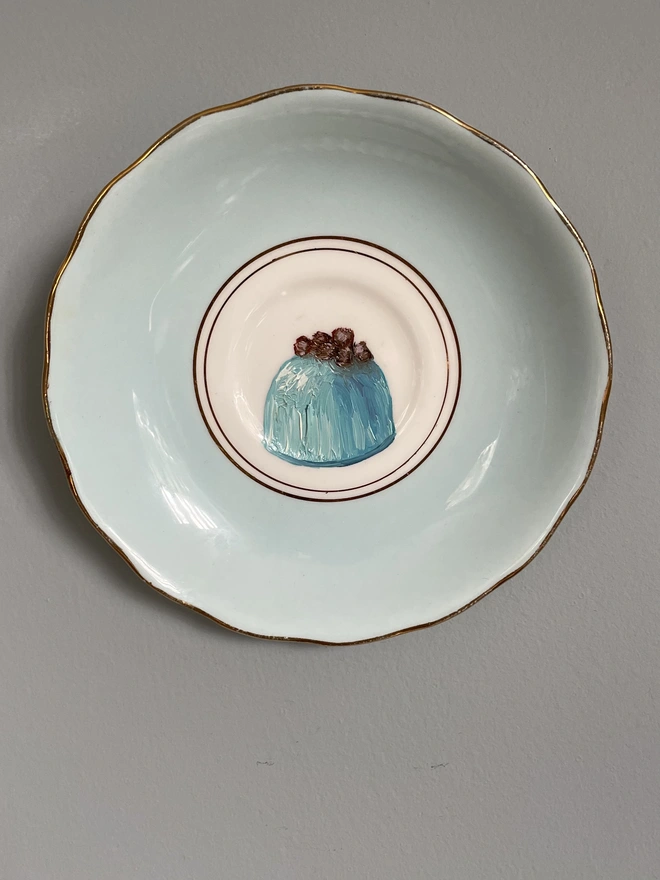 mint chocolate painting on saucer