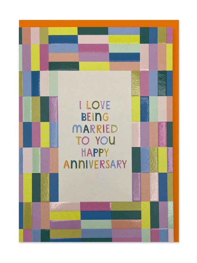 A colourful anniversary card with rainbow colour blocking pattern and a heartfelt ‘I love being married to you. Happy Anniversary’ message 