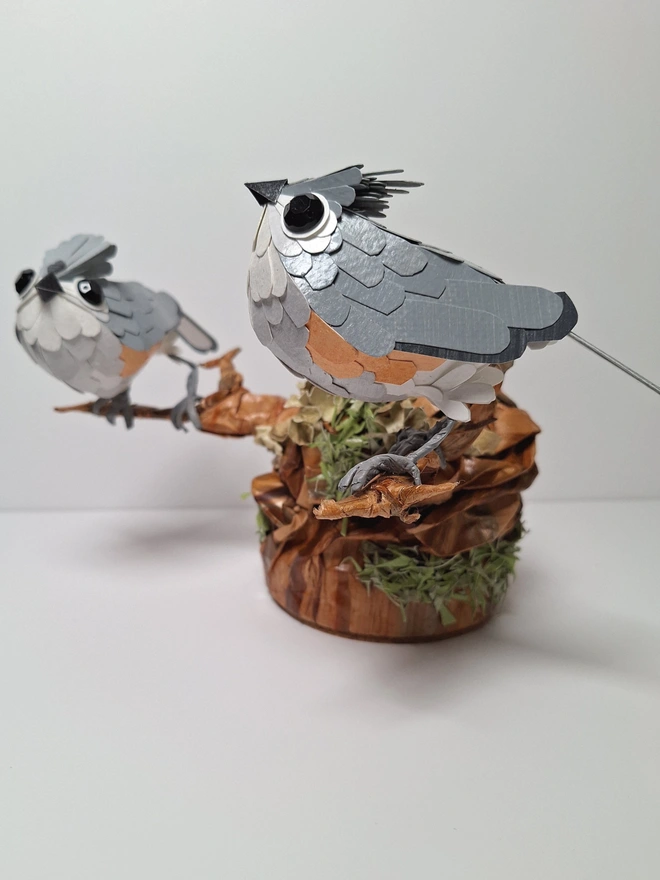 Tufted Titmice on a trees tump handmade bird sculpture