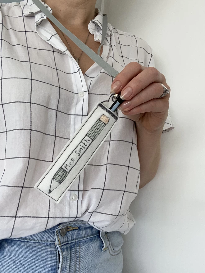 Personalised Teachers Pen Holder Lanyard being held by person in check shirt