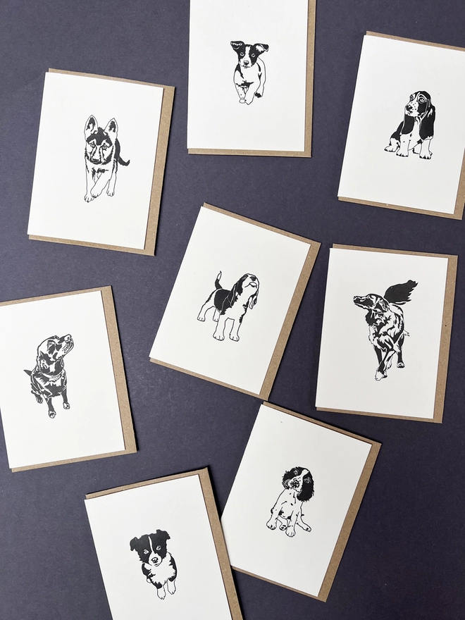 All eight letterpress printed Country dogs, Alsatian, Beagle, Jack Russell, Basset Hound, Lab, Collie and Springer