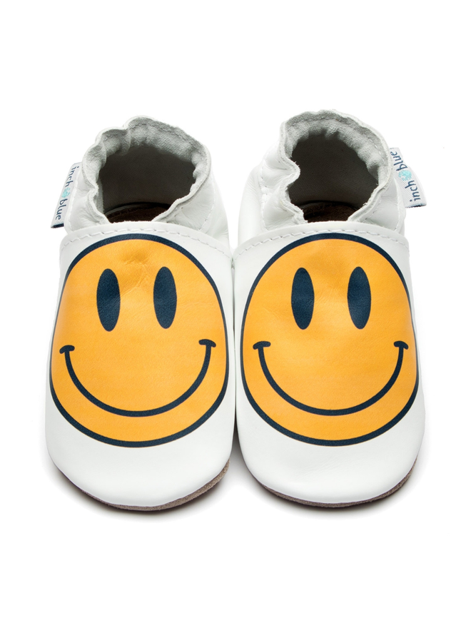 yellow smiley face baby shoes