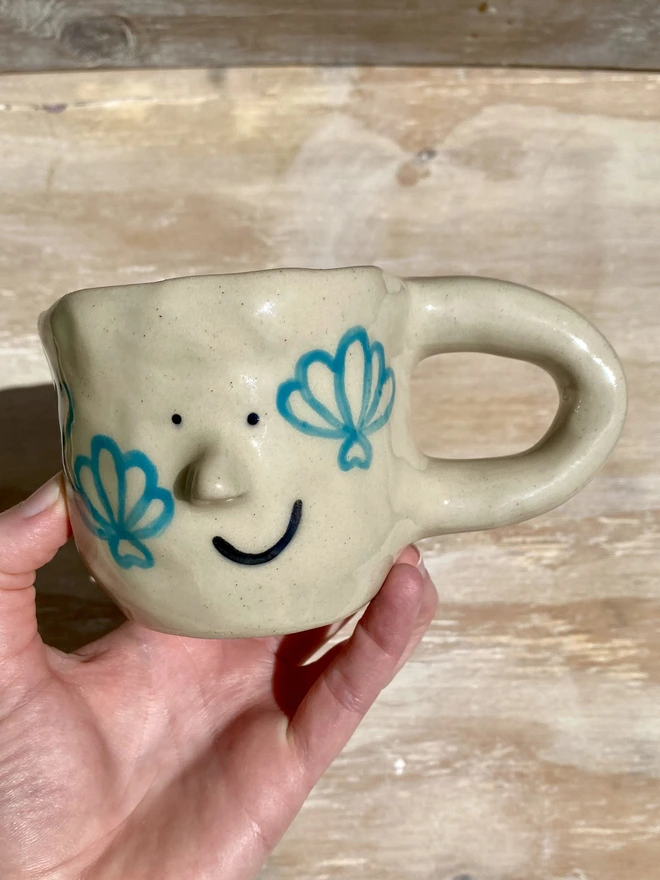 shell mug - held