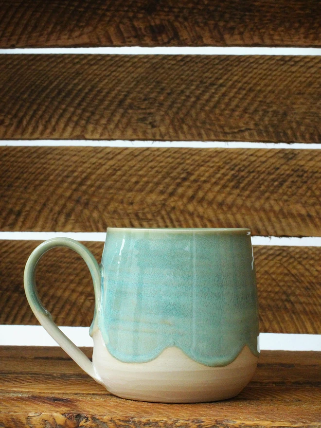 ceramic mug with green glaze