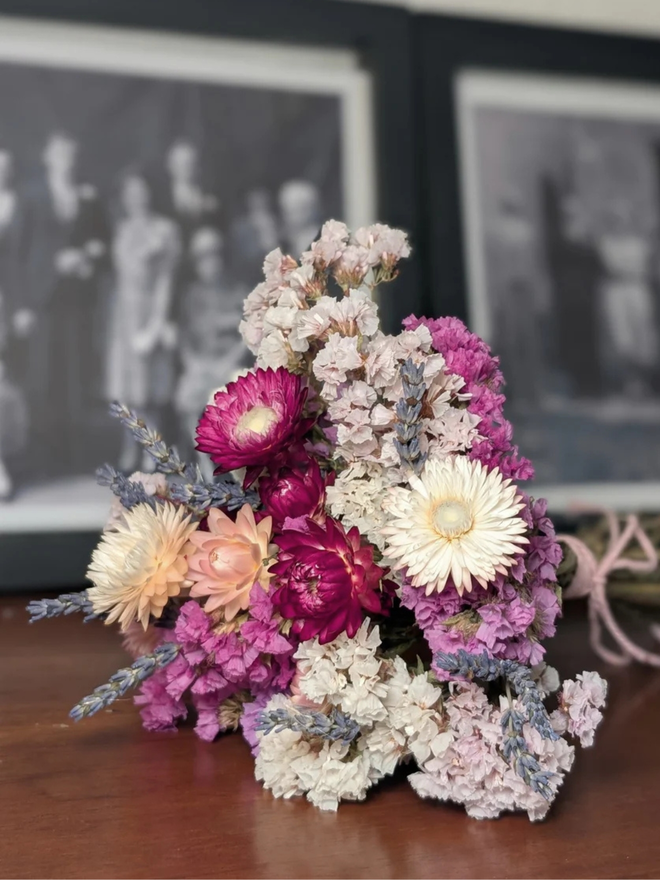 dried flower kit. pink, white and purple dried flower kit assembled into bouquet.