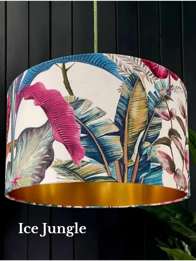 Ice Jungle velvet lampshade with colourful tropical leaves and gold lining