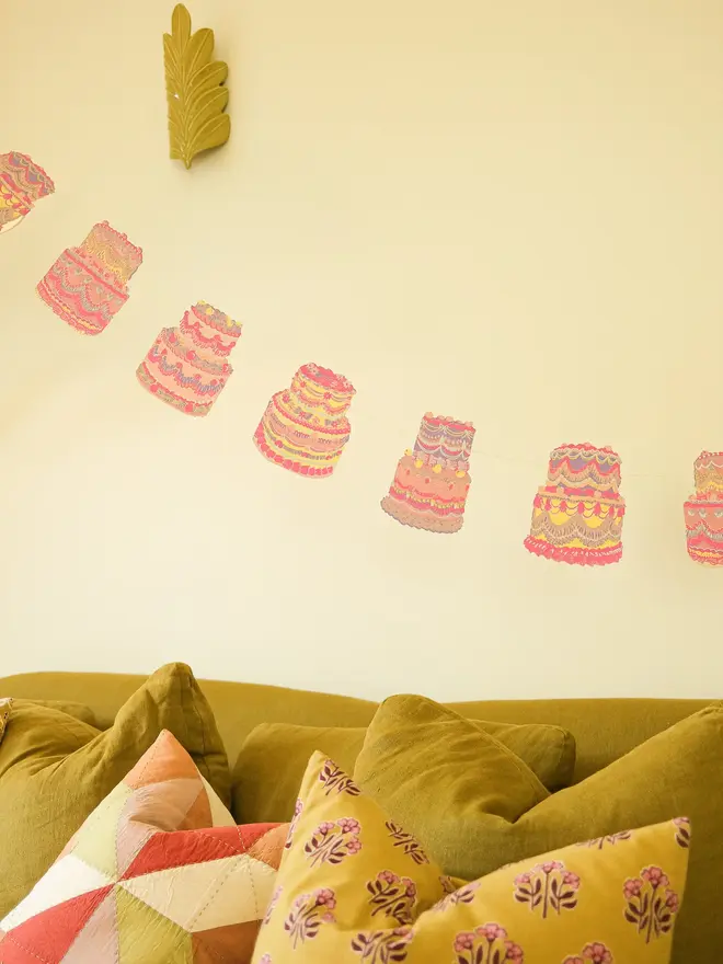 Celebration Cakes Sewn Garland in pinks and purples 