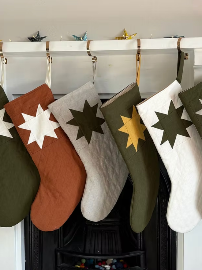 Medium Star Quilted Linen Christmas Stocking. A selection of stocking designs.