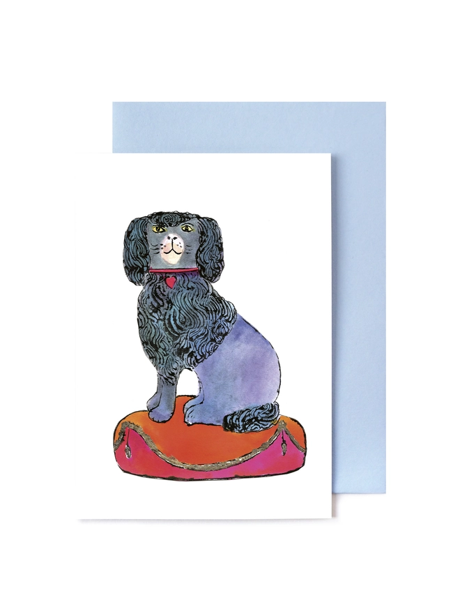 Greeting card featuring a pen and ink illustration of a poodle dog sitting on a fancy cushion with a Wedgwood blue envelope and blank inside for your own message.