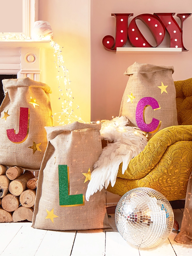 Personalised 3D initial Christmas sacks in various colours with disco ball and joy sign