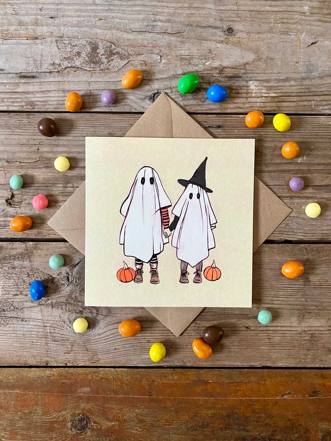 2 sweet ghost friends drawn on the front of a halloween greeting card