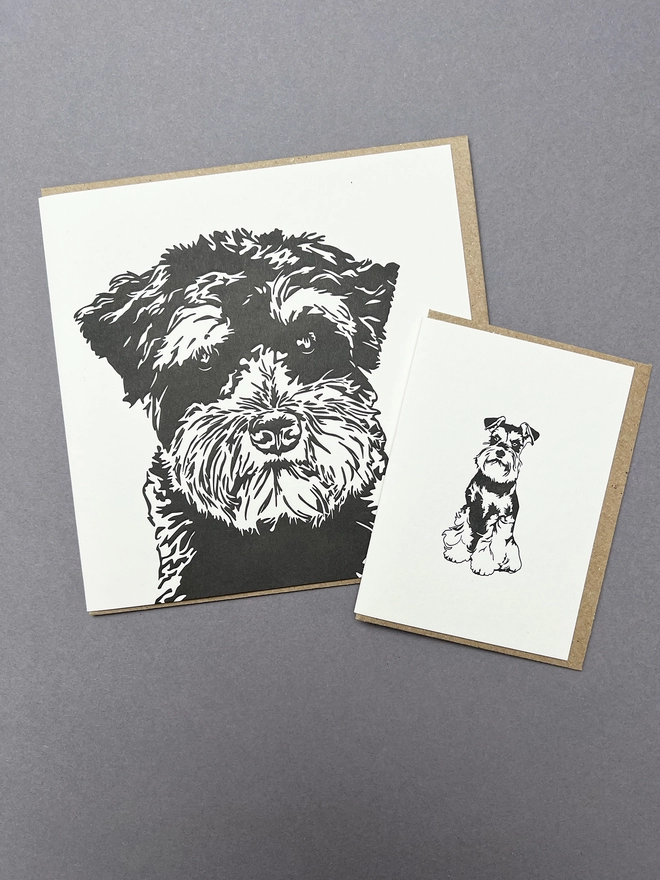 Big and little Schnauzer cards with envelopes next to each other