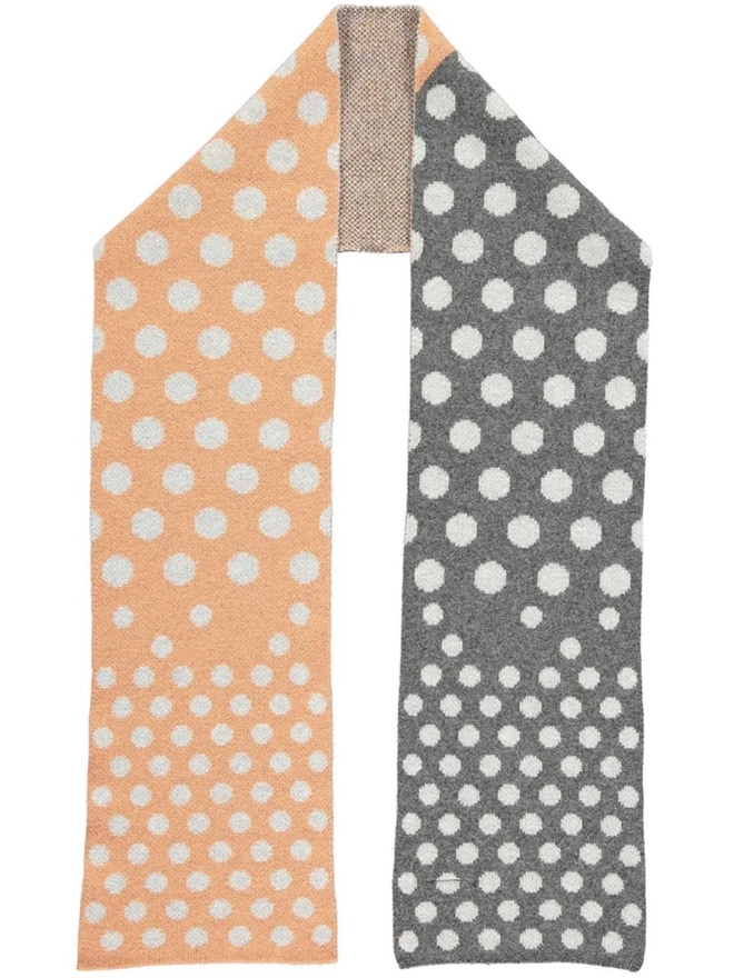 Lambswool Striped Scarf, a colourful striped scarf sitting on a plain white surface. 
