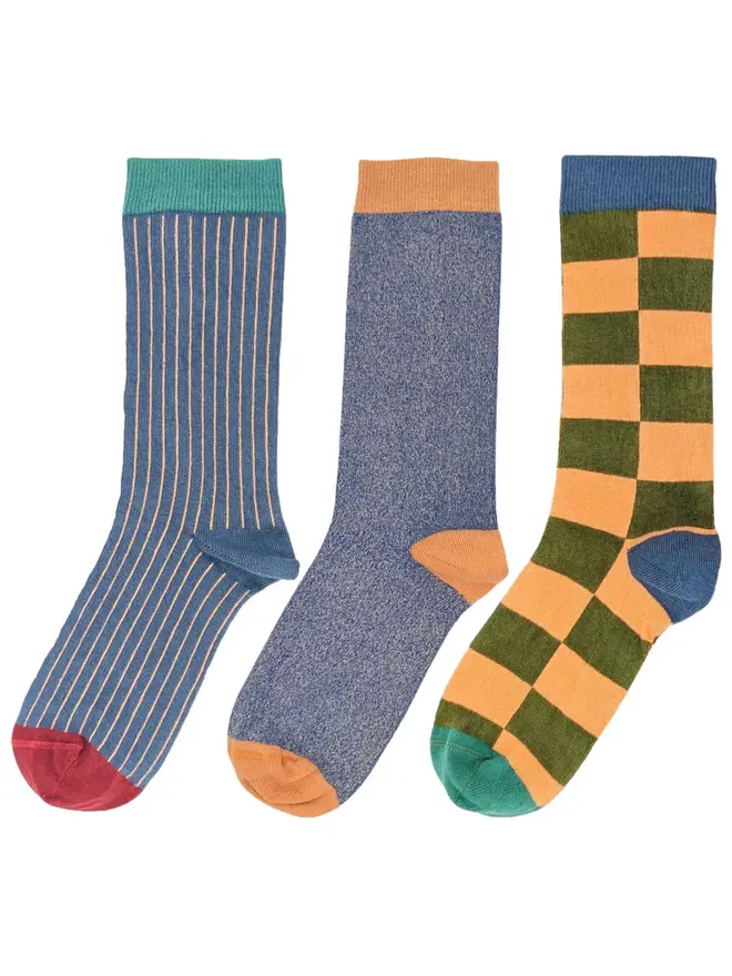 Women's Organic Cotton Ankle Socks Packs (Sets Of 3), a pack of three colourful patterned socks sitting on a plain white surface. 