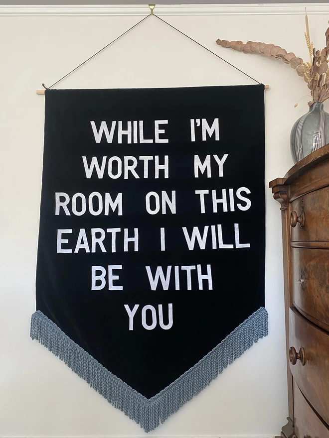 favourite sayings stitched onto custom velvet wall hangings
