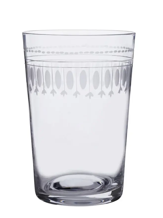 engraved ovals crystal tumblers (set of 6). a glass with delicate oval patterns around the rim.