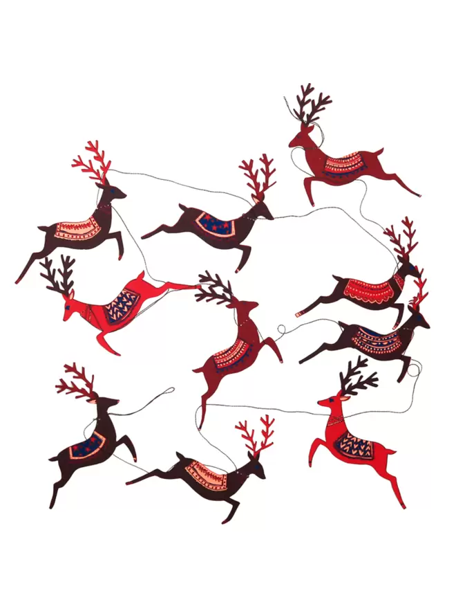 White cut-out shot: all 10 red reindeers laid out