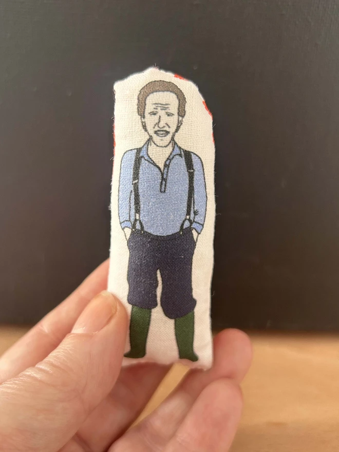 Mini illustrated fabric figure of Gardener's World presenter, Monty Don.