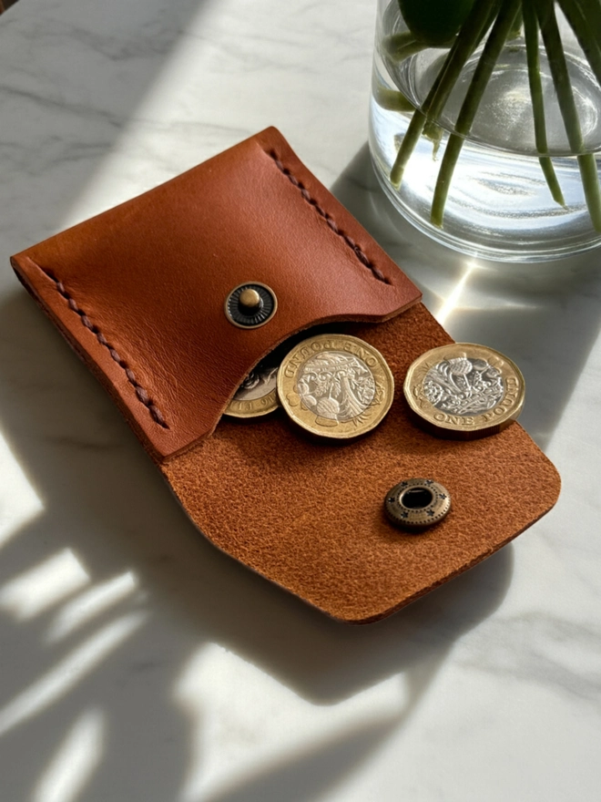 tan leather coin purse