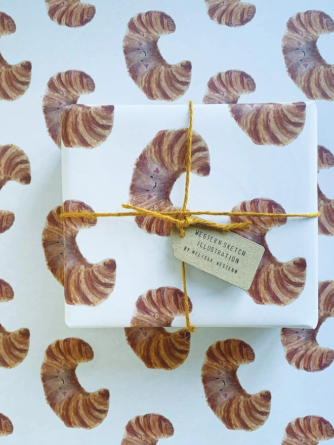 Wrapped Gift Using Croissant Wrapping Paper 